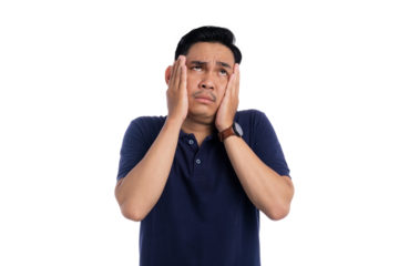 Stressed man touching his face with worried expression wearing navy blue polo shirt isolated on transparent background