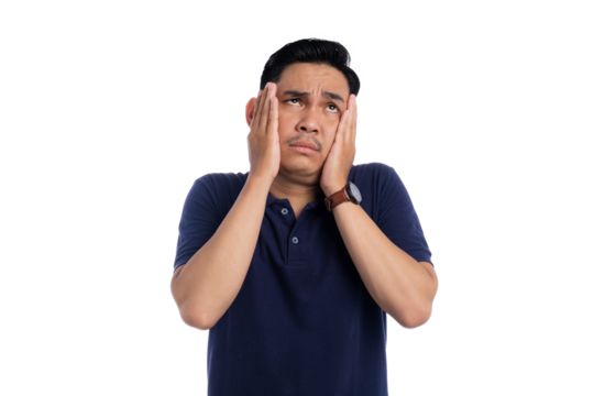 Stressed man touching his face with worried expression wearing navy blue polo shirt isolated on transparent background