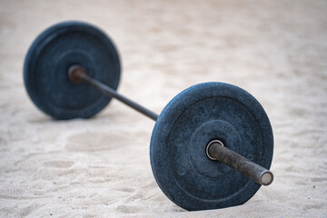 Summer workout with Barbell weights. Barbell in nature setting. Motivation for bodybuilding....