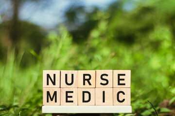
A close-up image displaying wooden letter blocks arranged to spell 