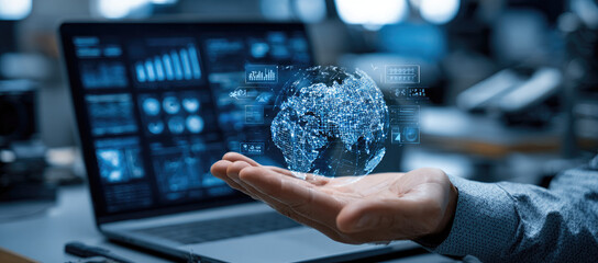 Hologram globe held in hand over tech dashboard