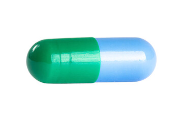 a green and blue pill on a white background