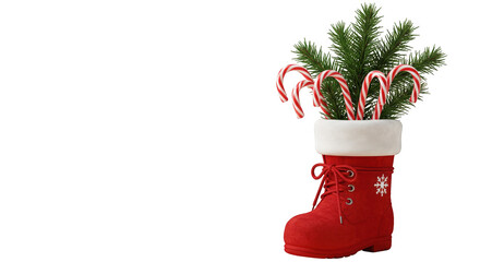 A festive red boot filled with candy canes and evergreen branches, ready for Christmas.