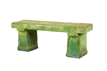 a green bench sitting on top of a white floor