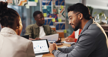 Man, woman and graphic designer with tablet, meeting and review charts for project management at startup. People, tech and team with graphs, talk and application ux with advice at creative agency