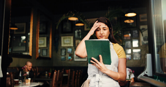 Waitress, stress or woman at cafe with tablet for inflation, bankruptcy or financial crisis. Sad, headache or barista at coffee shop with mistake, fail or reading bad review on social media with tech