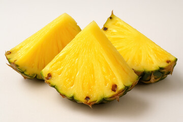 pineapple pieces on white surface.