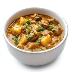 Fototapeta premium A vibrant bowl of spicy chicken curry with fresh vegetables, perfect for a traditional hot dinner