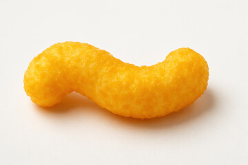 Yellow dough being kneaded by hands.