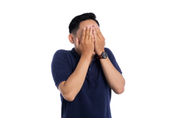 Embarrassed Asian man covering face with hands showing shyness and awkward expression isolated on transparent background