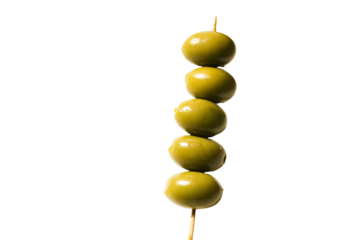 a bunch of olives on a stick on a white background