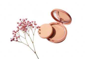 A delicate pink flower arrangement beside an open compact powder with a puff isolated on transparent background