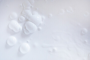 white paint background with air bubbles when mixing before painting