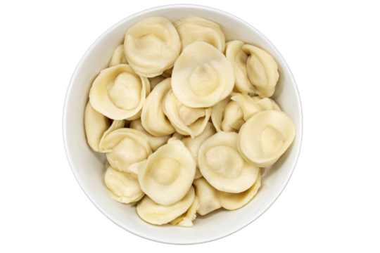 a bowl of pasta shells on a white surface