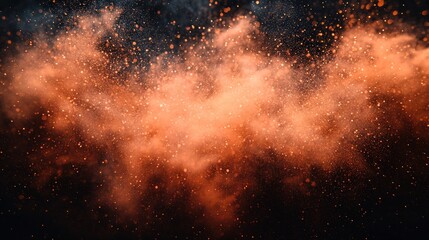 Abstract Orange Dust Explosion on Black Background