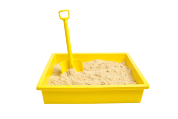 a yellow sandbox with a shovel in it