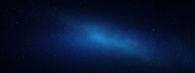 Obraz premium Deep blue starry night sky with scattered stars, evoking a sense of tranquility, mystery, and the infinite expanse of the universe.