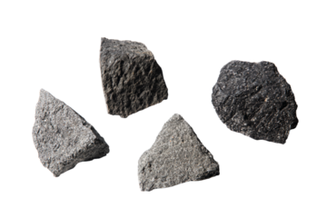 a group of rocks sitting on top of a white surface