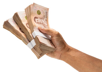 Hand holding Bundle of Thai 1000 bath banknotes isolated on white background, Hand holding Bundle of Thai 1000 bath banknotes on White Background With clipping path.