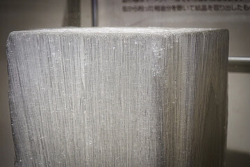 Close-up view of a giant menthol crystal with visible fibers from mint essential oil extraction