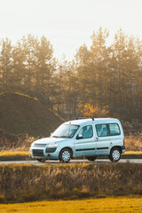 Modern white cargo van in motion