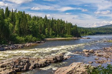 View of the raging rapids of the Kazyr River. Near Kuragino, Russia
