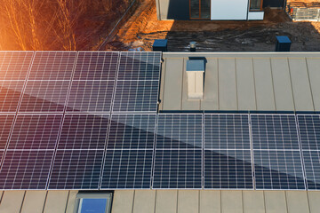 Eco-friendly houses with rooftop solar panels