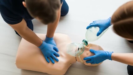 Heartpumping cpr training session for life saving techniques on a mannequin, suitable for medical training materials and healthcare educational resources.