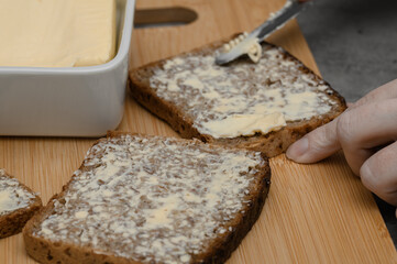 Delicious sandwiches with sourdough rye bread spread with real cow's milk butter
