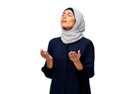 Young woman in hijab praying with closed eyes on transparent background, PNG