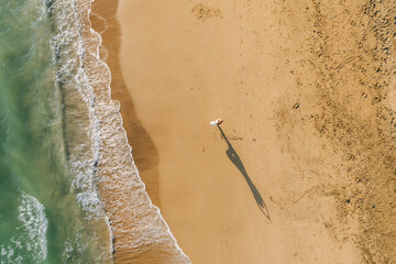 Woman Practicing Yoga Alone on Ocean Beach – Aerial View