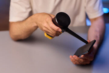 The Innovative Smartphone Cleaning Device is Being Demonstrated During Use and Functionality