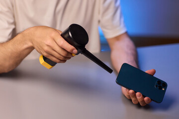 The Innovative Smartphone Cleaning Device is Being Demonstrated During Use and Functionality