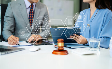 Professional business team planning legal-tech strategy, showcasing teamwork, digital security, and...