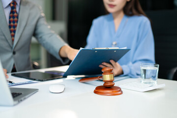 Professional female lawyers consulting on legal cases in office. Perfect for law, business,...