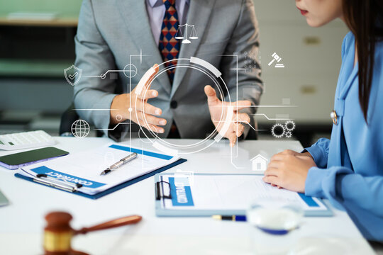 Professional business team planning legal-tech strategy, showcasing teamwork, digital security, and corporate consulting in office