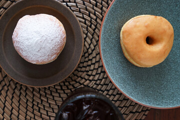 Close up Bavarian cream donut, filled with custard and powdered sugar served with old fashioned...