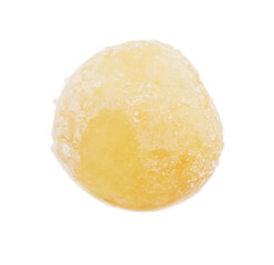 A small, round, yellow object with a white background