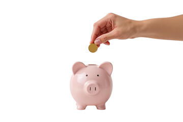 Putting coin in piggy bank, symbolizing of saving money or financial planning, investment, economics, personal finance.