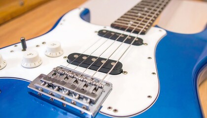 Close-up of a bright blue electric guitar