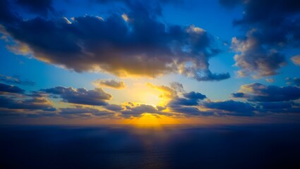 Fototapeta premium Beautiful ocean sunset with clouds and blue sky nature landscape scenic background image
