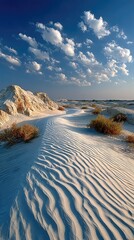 White Sandy Desert with Wind Sculpted Ripples Under a Blue Sky