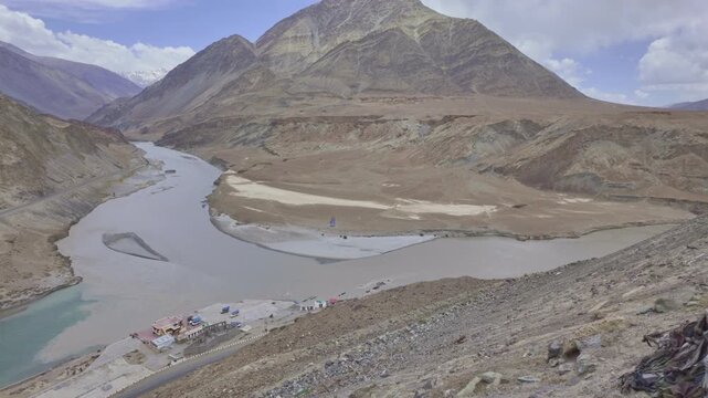 Sangam Point is the confluence Indus and Zanskar Rivers at Leh, Ladakh, India
The confluence of the Indus and Zanskar rivers has two different colors of water between Kargil and Leh, India.