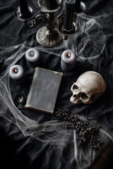 Dark Halloween flat lay, skull, candles, old spell book, cobwebs, gothic shadows