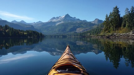 Kayak on a serene lake, mountains in the background