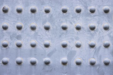 Metal plate and rivets texture background