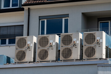 Rooftop air conditioning units on a modern building
