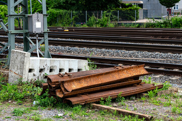 Railway tracks and rusted metal near train yard