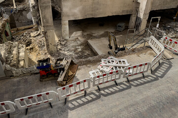 Construction site shows active demolition process