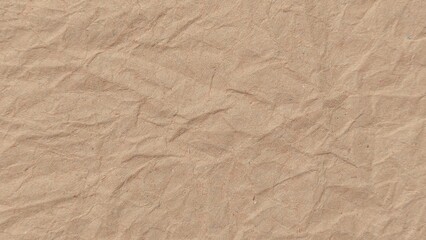Crumpled kraft old brown paper texture background with copy space for design. Crumpled old brown vintage paper surface texture for background.